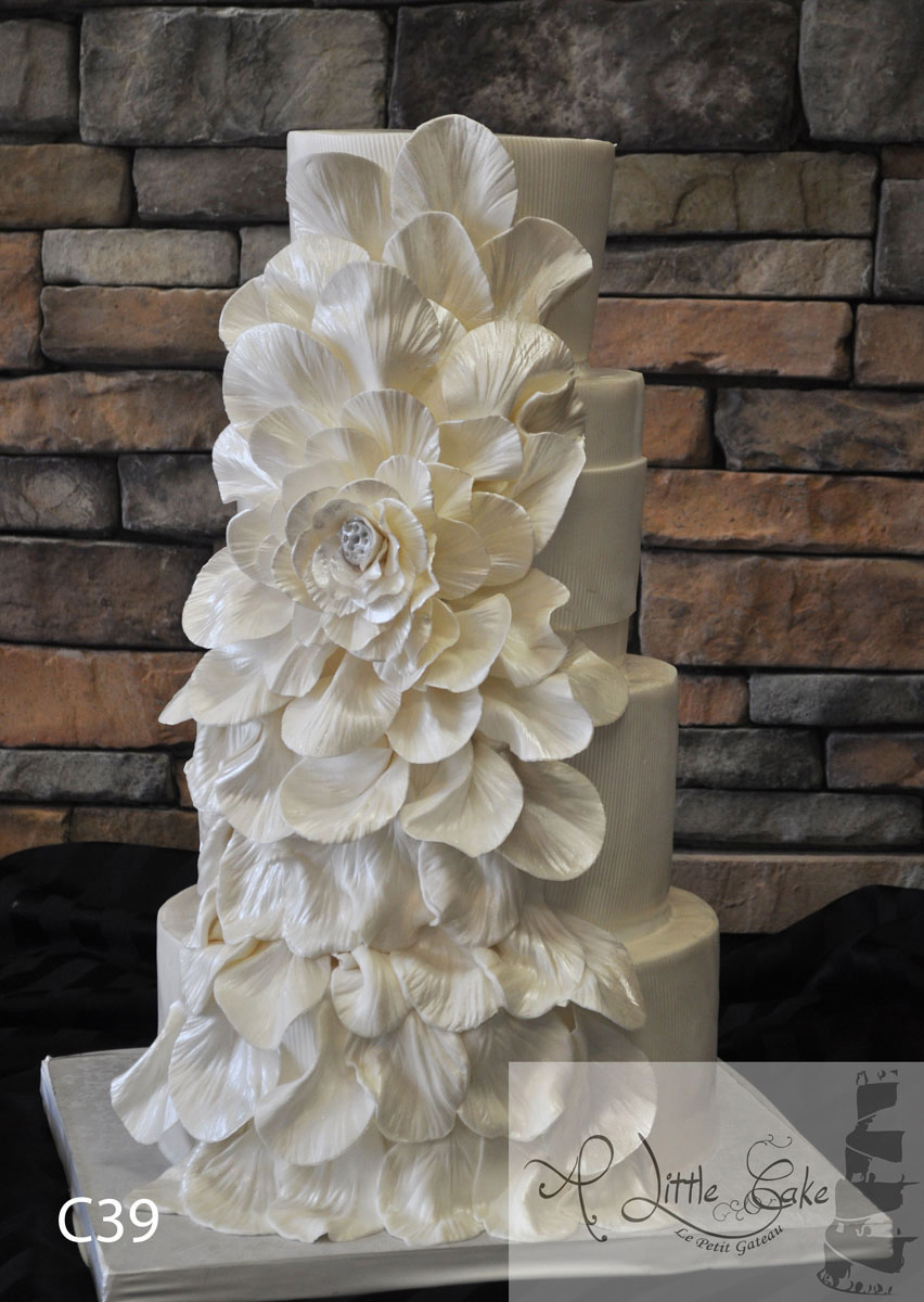 Fondant Wedding Cake With An Overflowing Flower A Little Cake