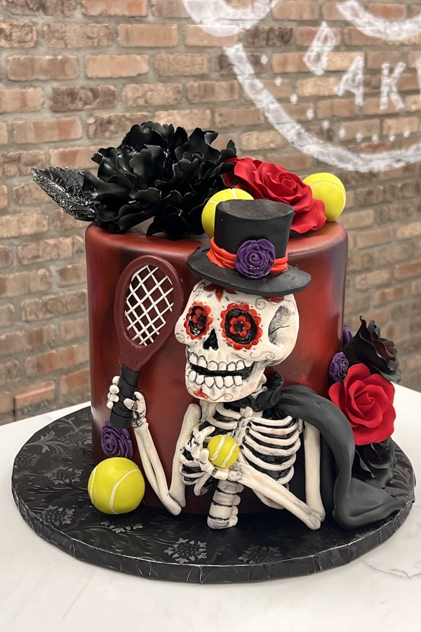 Day of the Dead cake with skeleton tennis player, tennis racket, tennis balls, sugar skull, top hat and roses. SEO Filename: day-of-the-dead-tennis-cake.jpg Website Search Tags: Day of the Dead cake, skeleton, sugar skull, tennis cake, tennis racket, tennis balls, top hat, roses, sculpted cake 4. Fall Pumpkin & Fancy Buttercream Flower Cake Website Description: An elegant fall cake featuring textured buttercream decorated with pumpkins, autumn leaves and handcrafted fancy buttercream flowers. The seasonal floral arrangement creates a warm, sophisticated design perfect for birthdays, Thanksgiving gatherings, showers and fall celebrations. Alt Text: Fall cake with pumpkins, autumn leaves, textured buttercream and fancy buttercream flowers. SEO Filename: fall-pumpkin-fancy-buttercream-flower-cake.jpg Website Search Tags: fall cake, pumpkin, fancy buttercream flowers, autumn leaves, floral cake, textured buttercream, Thanksgiving cake This is the exact format I'll continue using for the next batch.